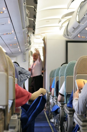 airplane etiquette, travel etiquette, business etiquette tips, polite manners, proper manners